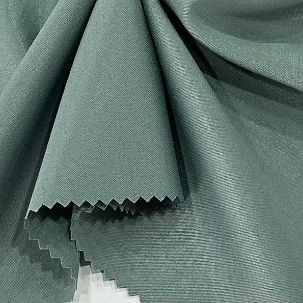 98% Polyester 2% Spandex Cationic Polyester Fabric 137GSM Dyed Bamboo Slub Weft Elastic Twill