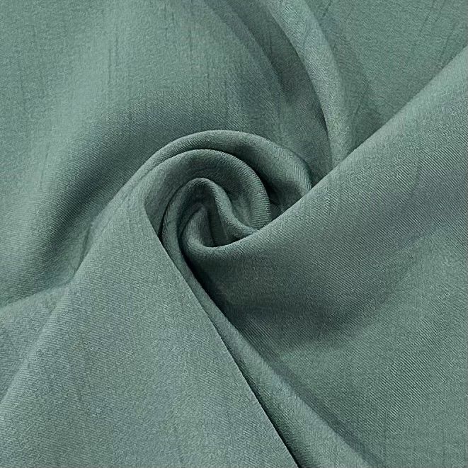 98% Polyester 2% Spandex Cationic Polyester Fabric 137GSM Dyed Bamboo Slub Weft Elastic Twill