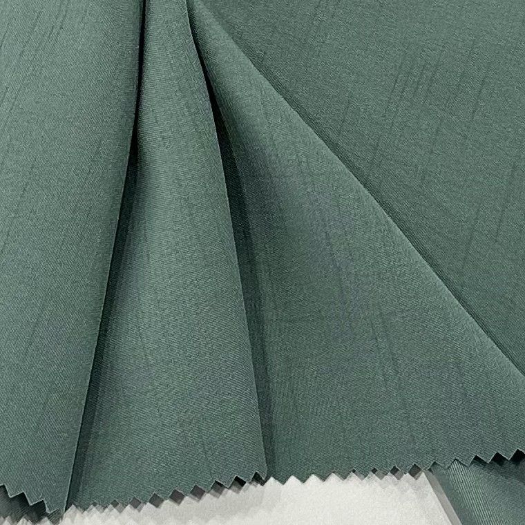 98% Polyester 2% Spandex Cationic Polyester Fabric 137GSM Dyed Bamboo Slub Weft Elastic Twill