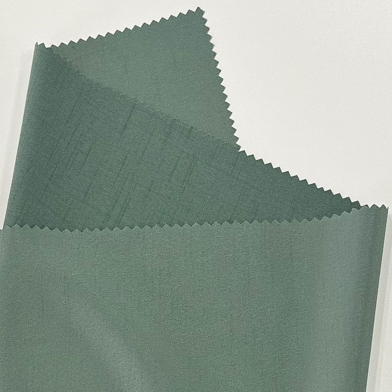 98% Polyester 2% Spandex Cationic Polyester Fabric 137GSM Dyed Bamboo Slub Weft Elastic Twill