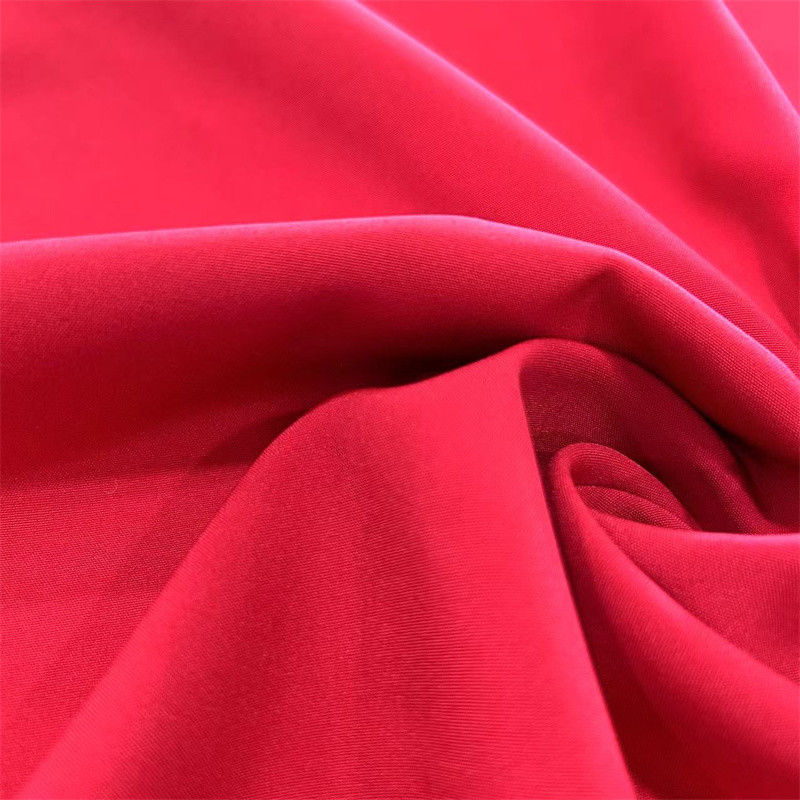 130GSM Soft Feel Recycled PET Fabric 100D 20D 4 way Stretch Plain Polyester Spandex Fabric